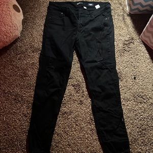 Size 10 womens black ripped jeans.